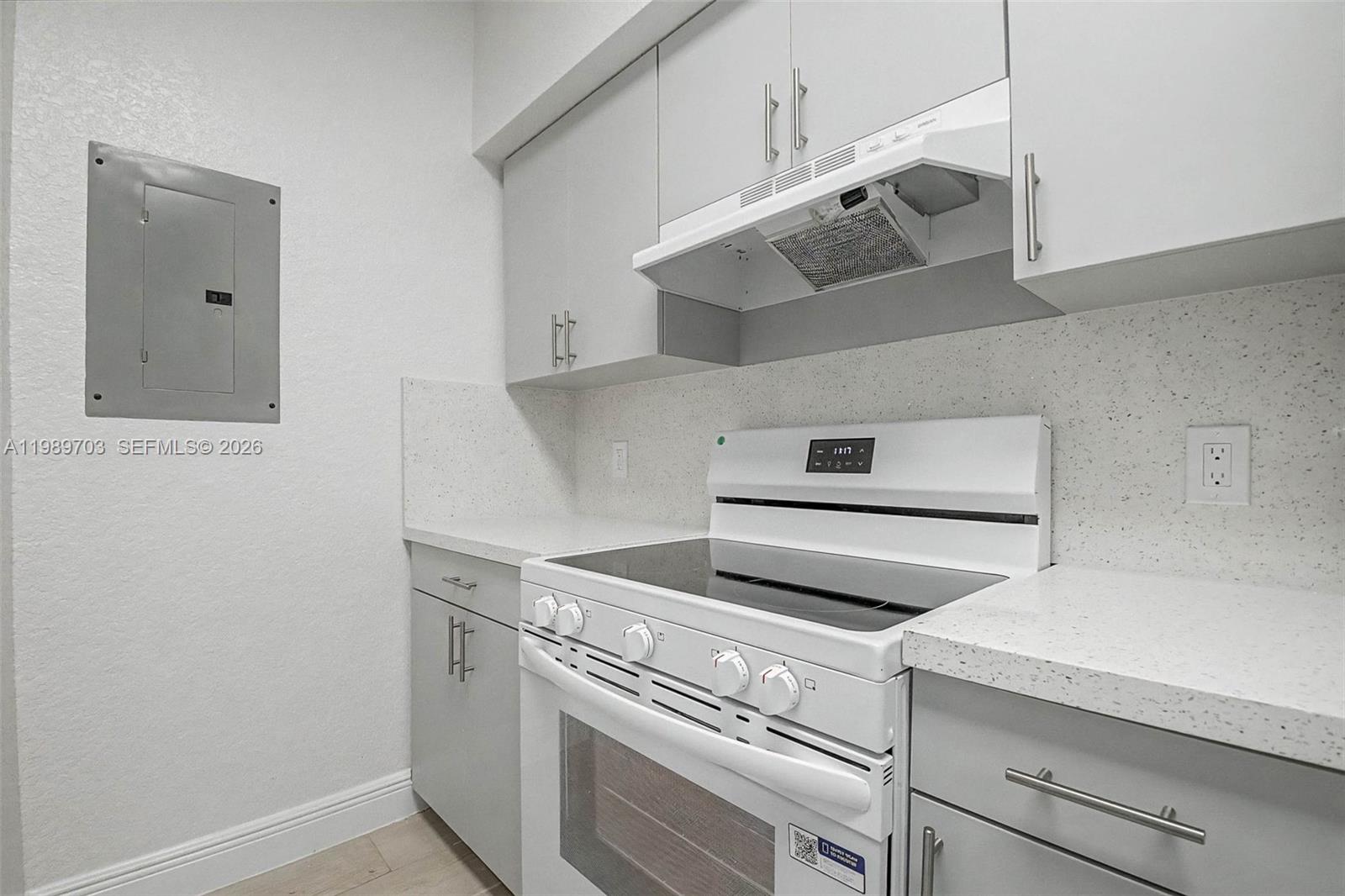7000 Southwest 80th Street, Unit 103 Miami, FL 33143 - Photo 9 of 16 a view of washer and dryer
