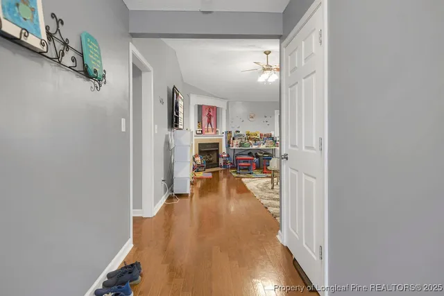 a view of a hallway view with staircase