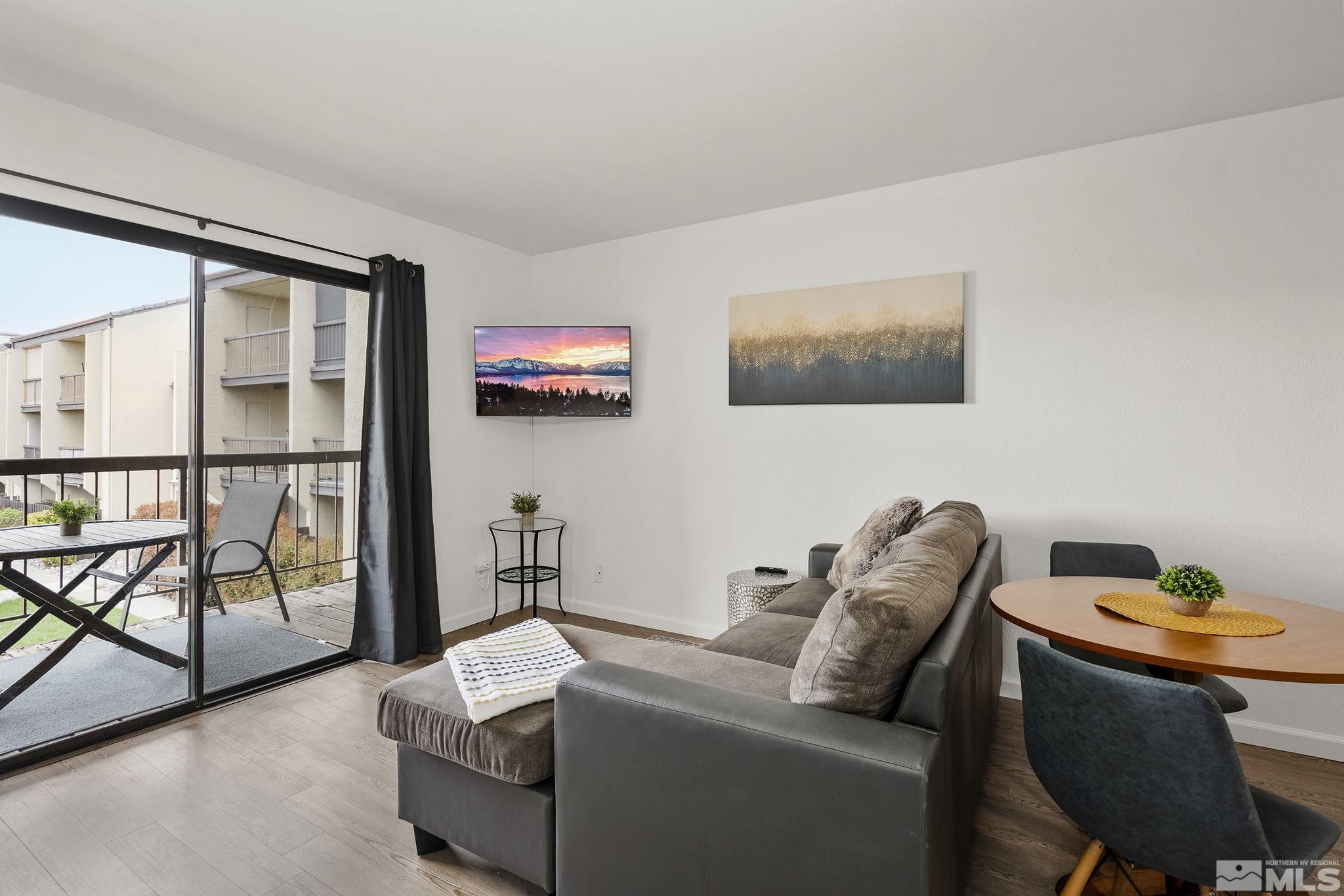 2450 Lymbery Street, Unit 214 Reno, NV 89509 - Photo 4 of 13 a room with furniture and a window