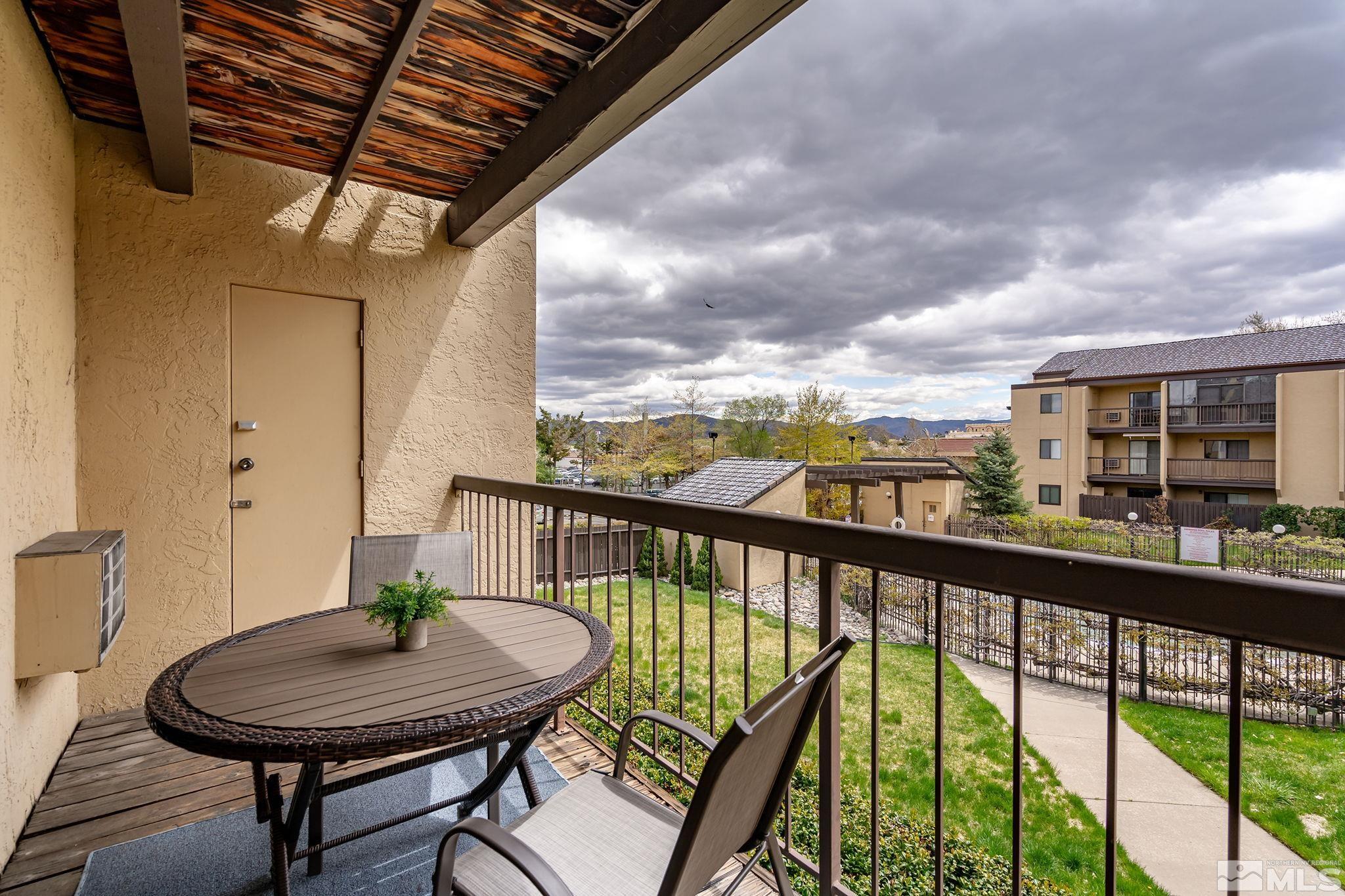 2450 Lymbery Street, Unit 214 Reno, NV 89509 - Photo 9 of 13 a view of a balcony with furniture