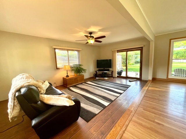 740 Summit Road Lake Zurich, IL 60047 - Photo 8 of 35 a living room with furniture and a fireplace