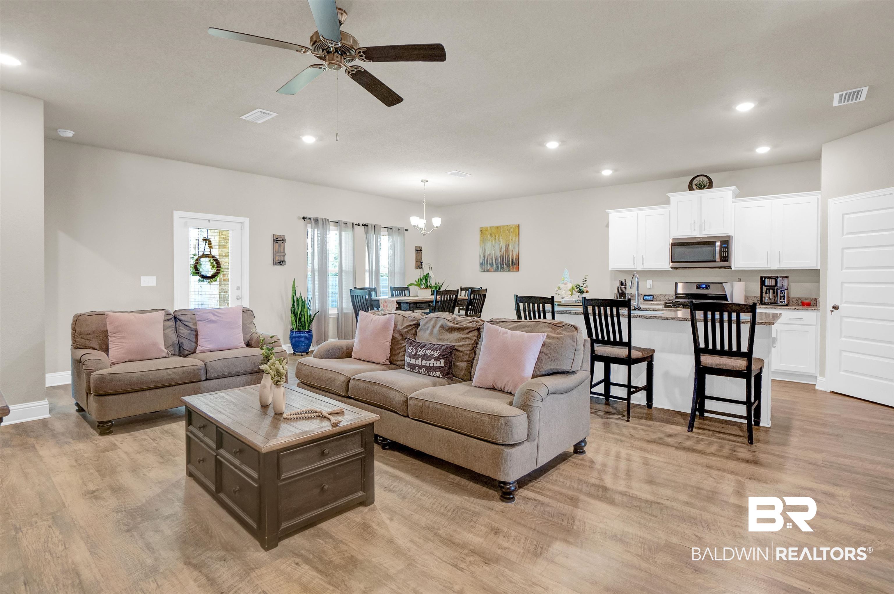 31671 Memphis Loop Daphne, AL 36527 - Photo 19 of 51 Living area with recessed lighting, ceiling fan with notable chandelier, light wood finished floors, and visible vents