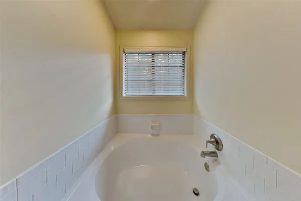 a bathroom with a bathtub