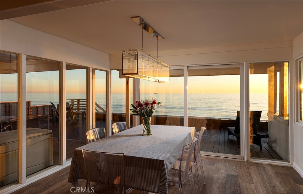 35661 Beach Road Dana Point, CA 92624 - Photo 19 of 52 a view of a dining room with furniture window and outside view