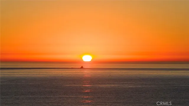a view of a chairs and table in patio