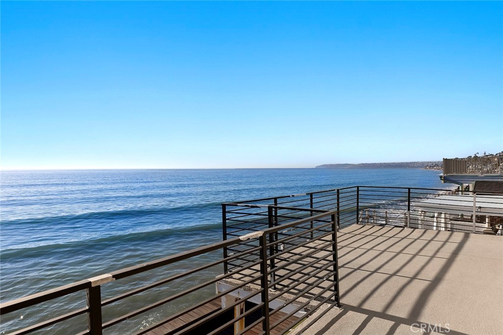 35661 Beach Road Dana Point, CA 92624 - Photo 41 of 52 a view of roof deck with wooden floor and city view