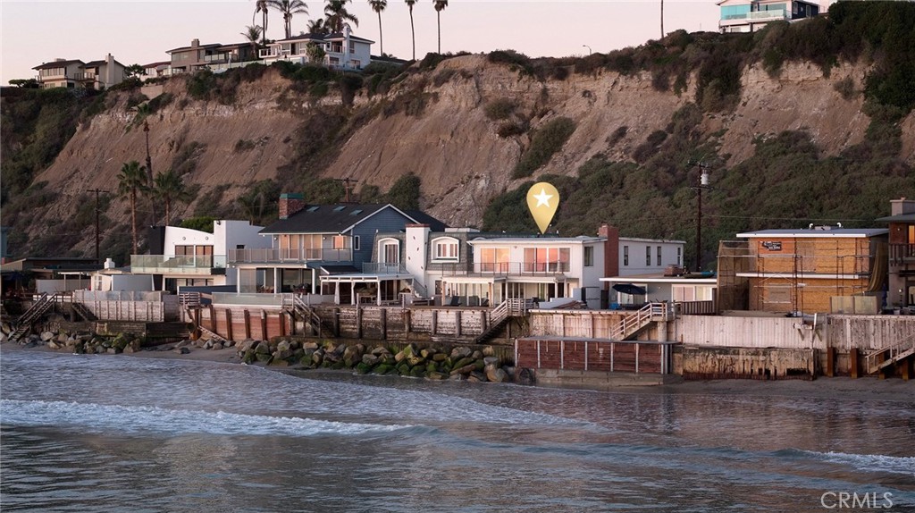 35661 Beach Road Dana Point, CA 92624 - Photo 7 of 52 a view of a house with a patio