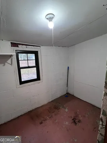 a view of a room with racks on the wall