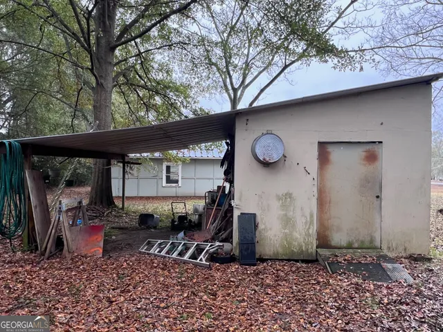 a living room with a couch and a flat screen tv