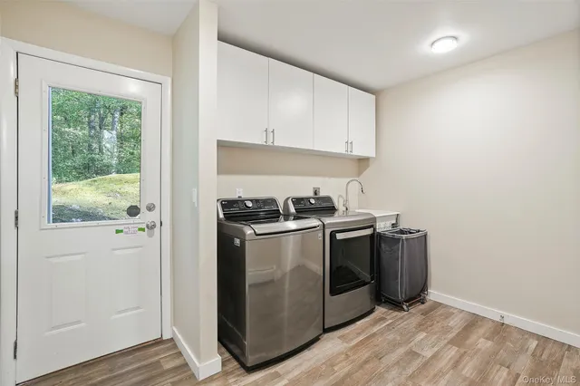 a kitchen with a stove and a refrigerator