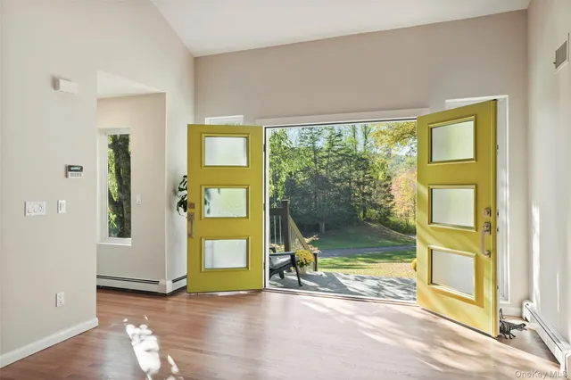 a view of an empty room with a window