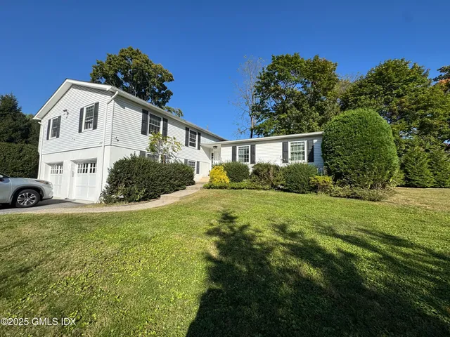 a house view with a garden space