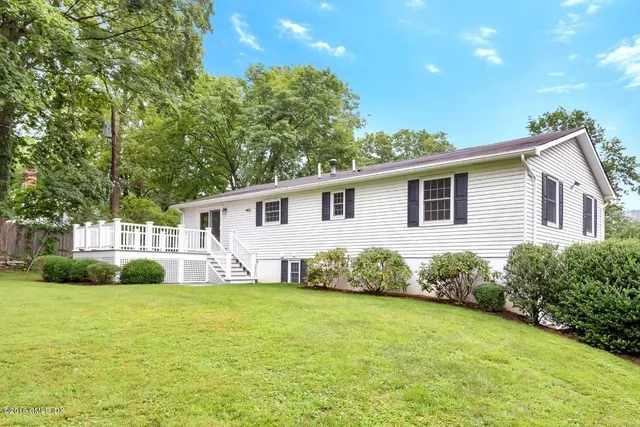 a view of a house with a patio