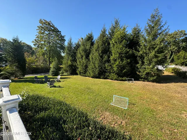 a view of a lake with a yard