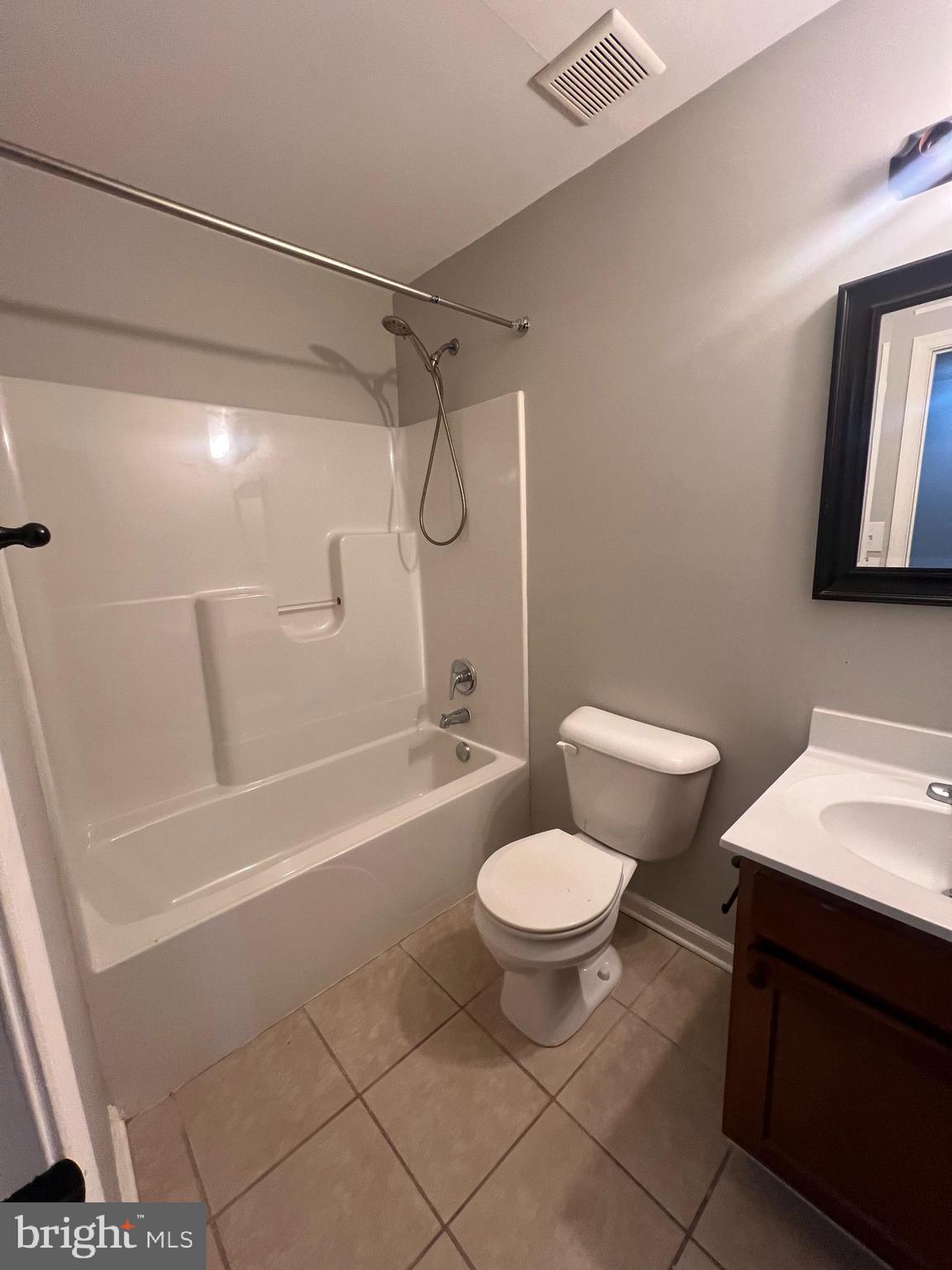 388 Dorothy Court Inwood, WV 25428 - Photo 17 of 19 a bathroom with a toilet a sink and bathtub