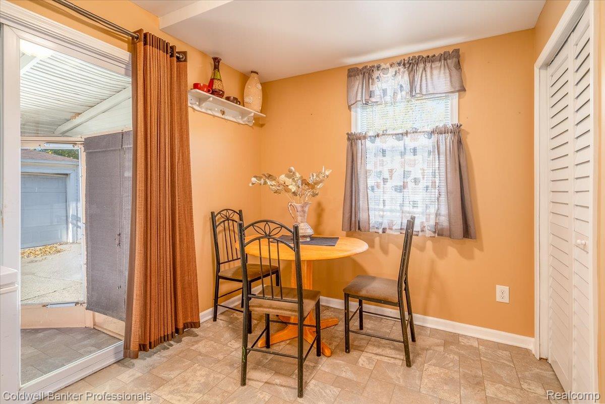 3582 Swanson Street Wayne, MI 48184 - Photo 13 of 30 Dining space with baseboards and stone finish flooring
