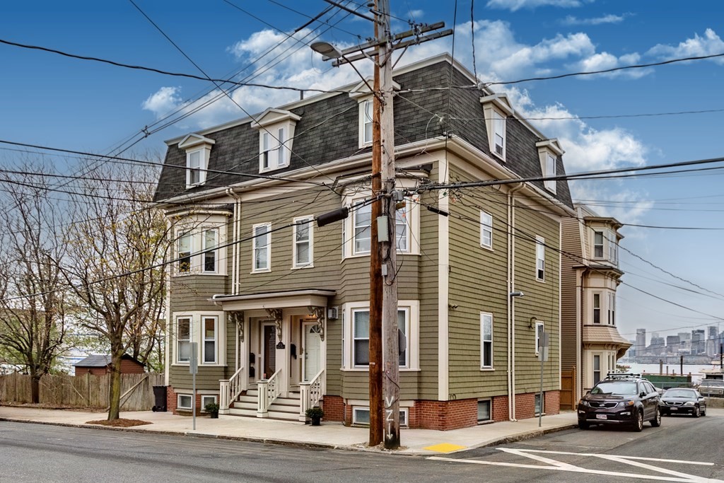 a view of a building with a street