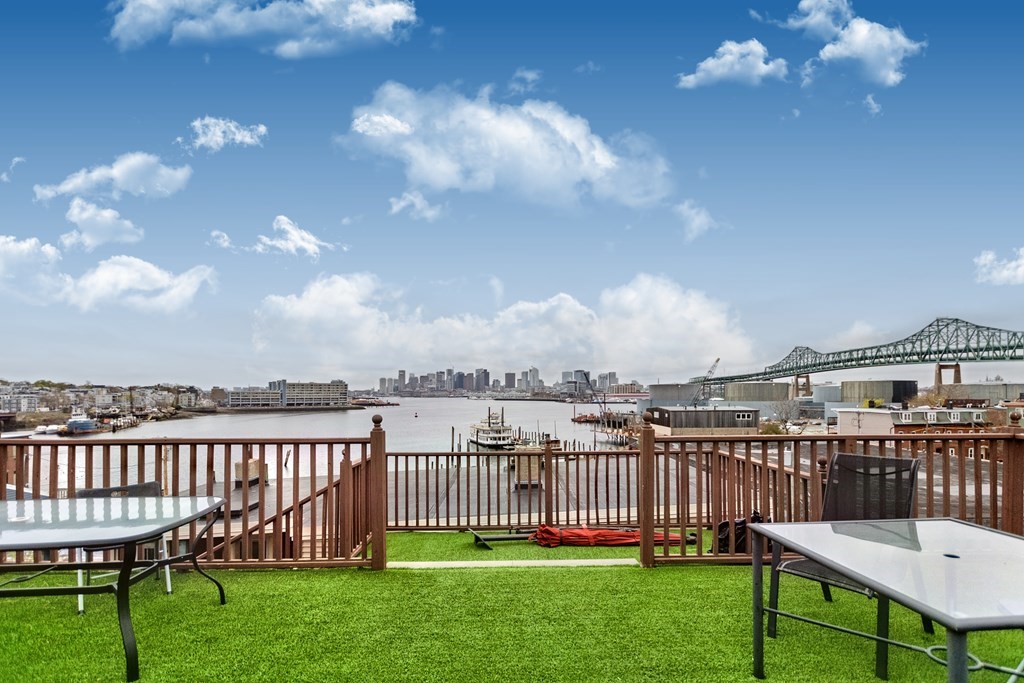 10 Beacon Street, Unit 3 Chelsea, MA 02150 - Photo 21 of 29 a view of a chair and table on the garden