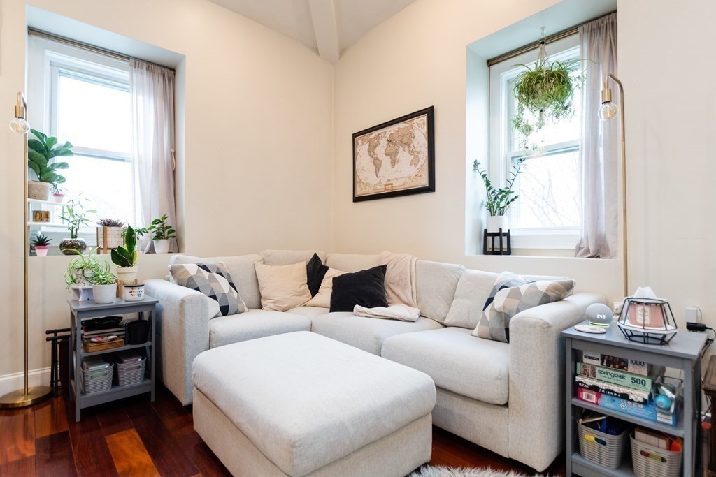 10 Beacon Street, Unit 3 Chelsea, MA 02150 - Photo 6 of 29 a living room with furniture and a window