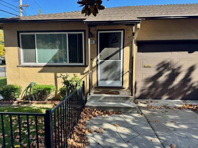 920 Warren Street Redwood City, CA 94063 - Photo 1 of 1 a front view of a house with a yard