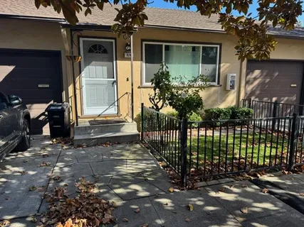 a front view of a house with a porch
