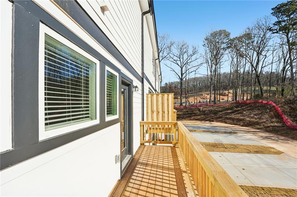 6450 Pinin Place Cumming, GA 30041 - Photo 50 of 53 a view of a swimming pool with a patio