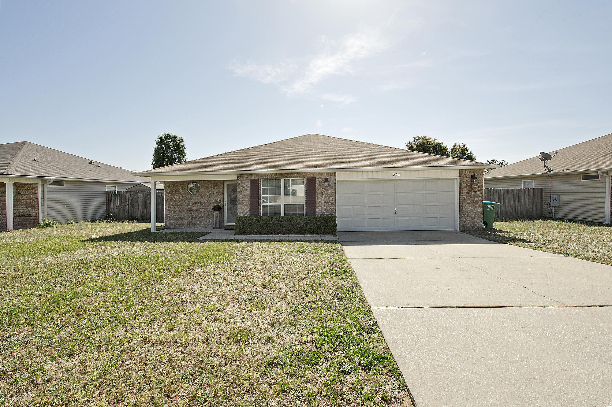 291 Limestone Circle Crestview, FL 32539 - Photo 1 of 19 a front view of a house with a garden