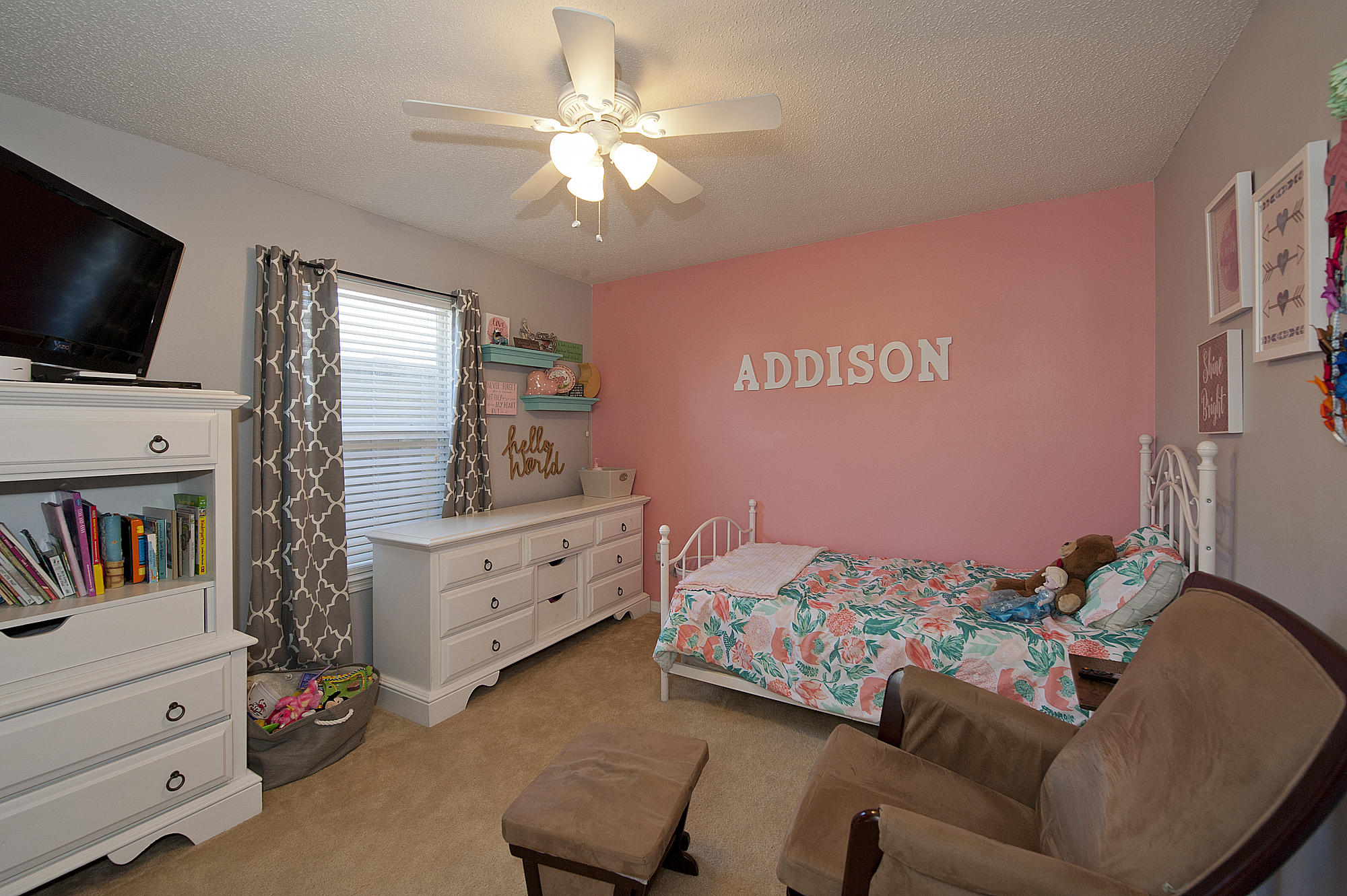 291 Limestone Circle Crestview, FL 32539 - Photo 14 of 19 a living room with furniture and a flat screen tv