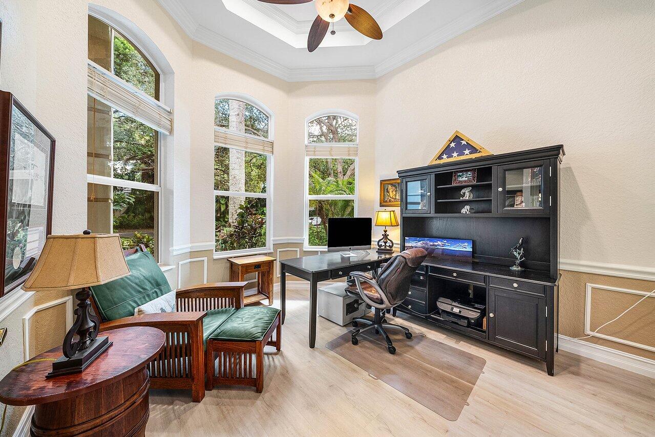 2560 Whispering Oaks Lane Delray Beach, FL 33445 - Photo 20 of 41 a view of a workspace with furniture and a window