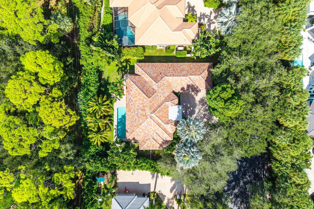 2560 Whispering Oaks Lane Delray Beach, FL 33445 - Photo 39 of 41 an aerial view of a house with a yard
