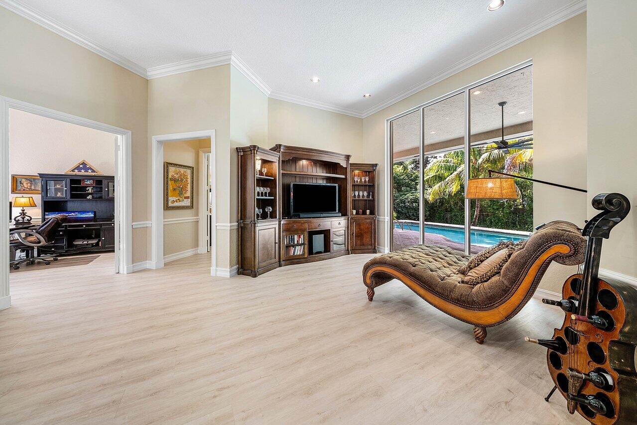 2560 Whispering Oaks Lane Delray Beach, FL 33445 - Photo 4 of 41 a view of a livingroom with furniture and windows