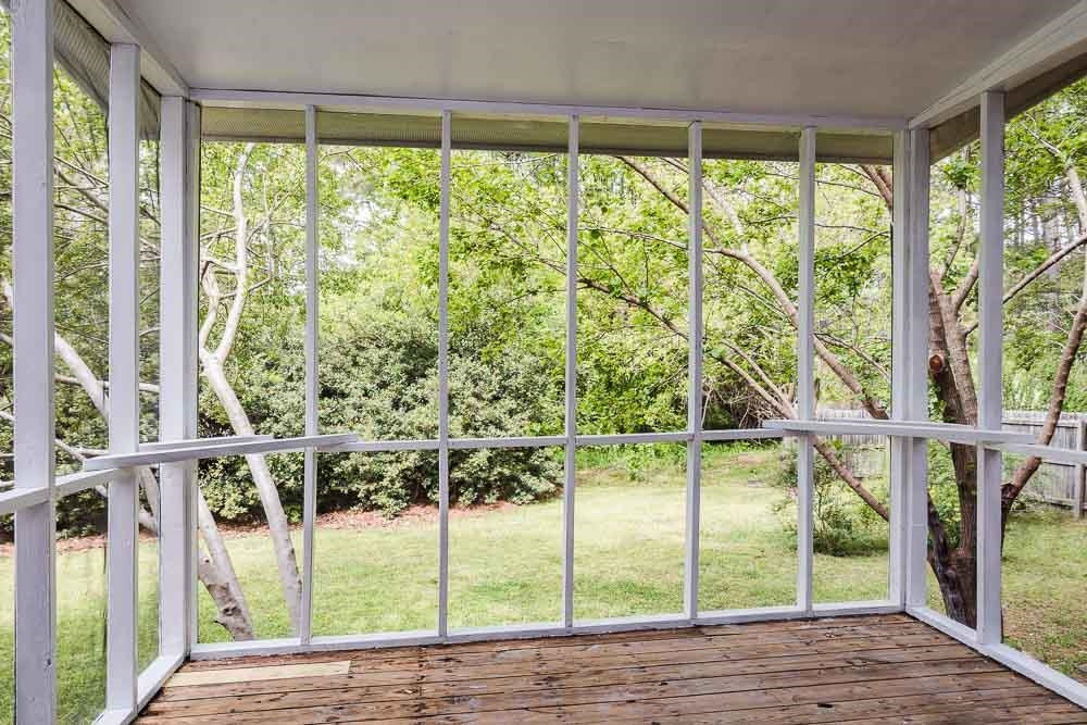 744 South Hollybrook Road Wendell, NC 27591 - Photo 20 of 30 Back screened in porch. Perfect for relaxing in your wooded backyard. Screened in Porch