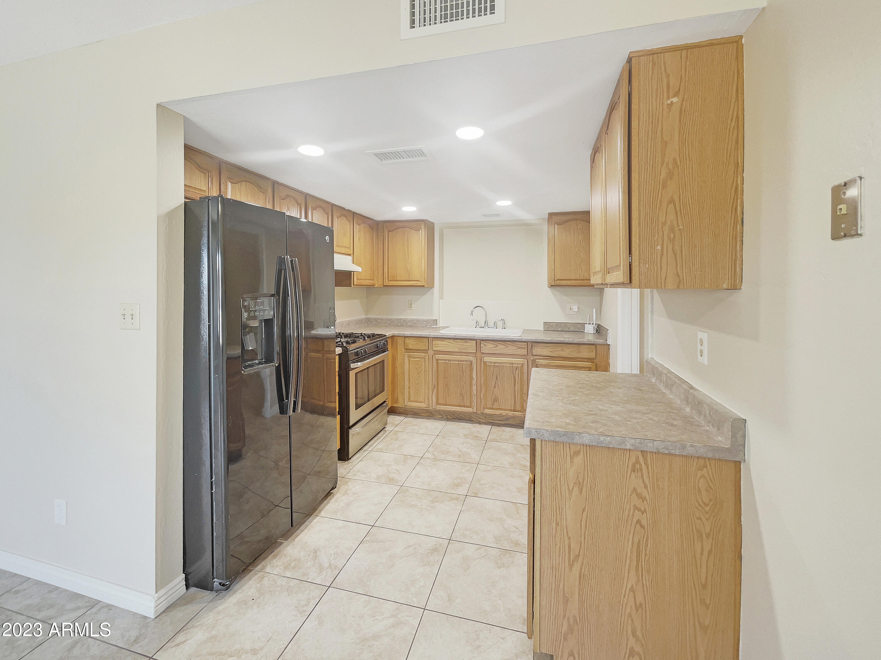 9013 West Roma Avenue Phoenix, AZ 85037 - Photo 5 of 25 photo_05