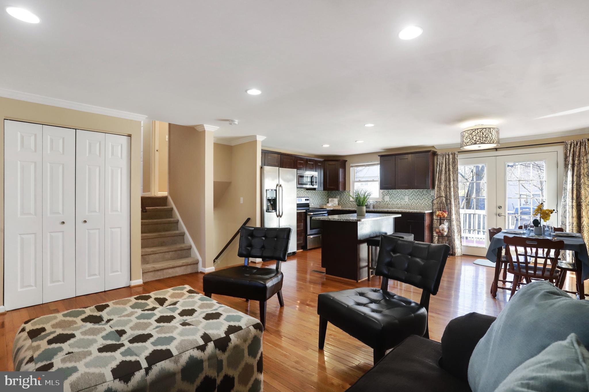 1771 Stonehaven Lane Frederick, MD 21702 - Photo 10 of 37 family room open to kitchen and dining