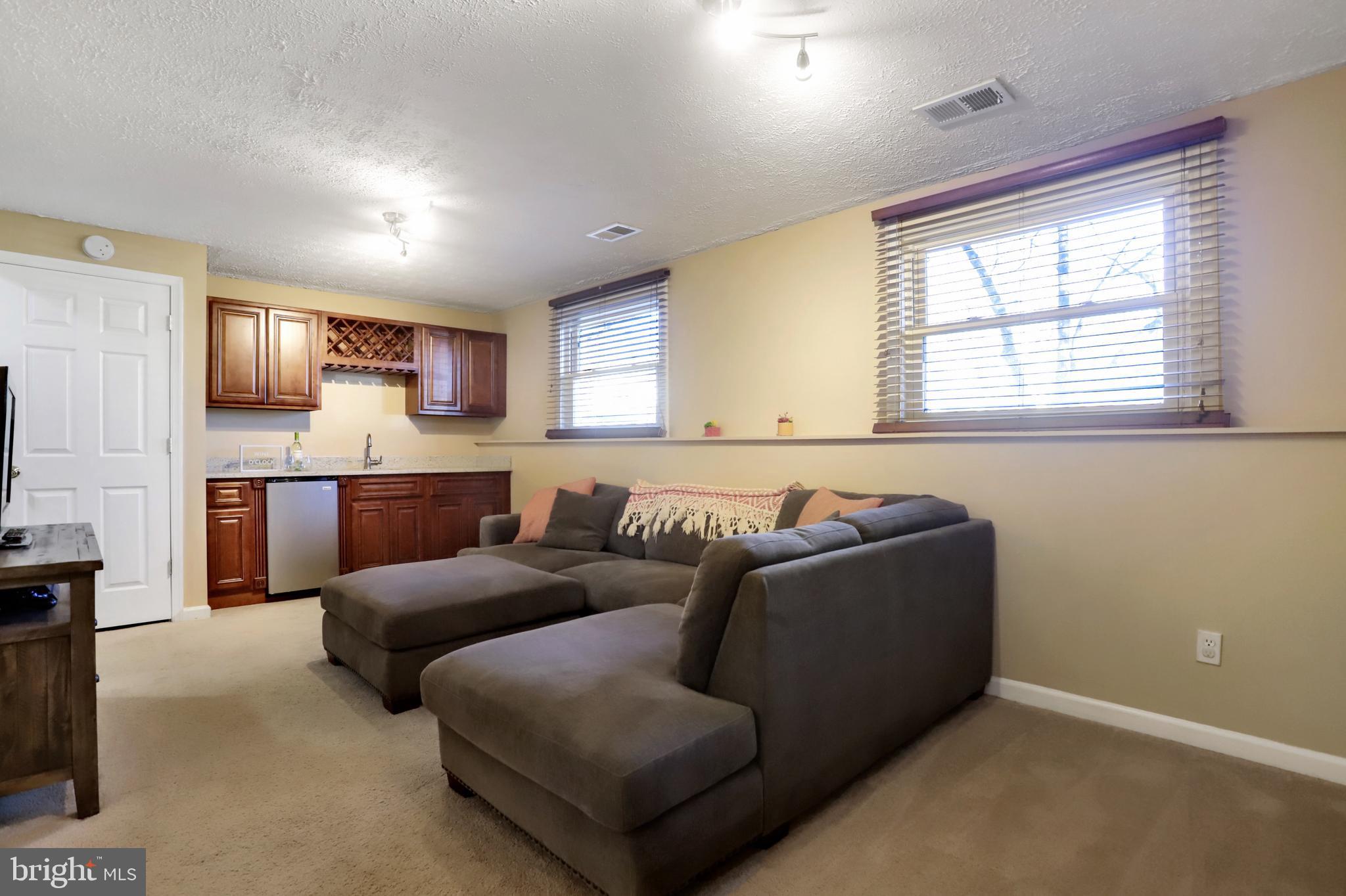 1771 Stonehaven Lane Frederick, MD 21702 - Photo 30 of 37 Finished basement with bar