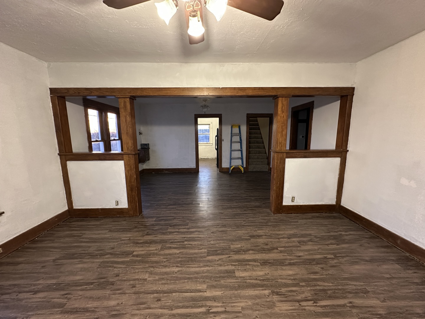 2750 North Henderson Road Freeport, IL 61032 - Photo 16 of 19 a view of a hallway with wooden floor and staircase