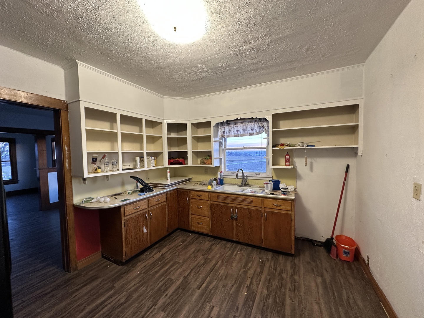 2750 North Henderson Road Freeport, IL 61032 - Photo 7 of 19 a kitchen with stainless steel appliances granite countertop a sink and wooden cabinets