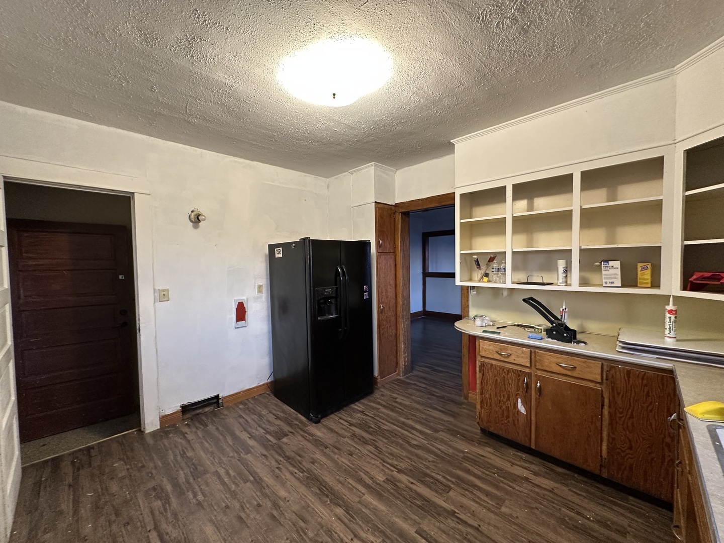 2750 North Henderson Road Freeport, IL 61032 - Photo 8 of 19 a kitchen with stainless steel appliances granite countertop a refrigerator and a sink