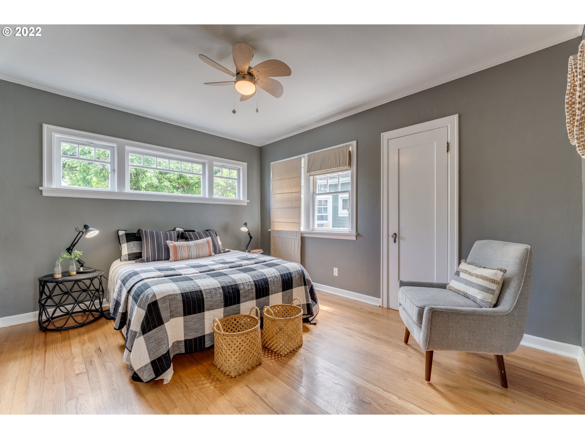 3310 Northeast 70th Avenue Portland, OR 97213 - Photo 12 of 21 a bedroom with furniture and a window