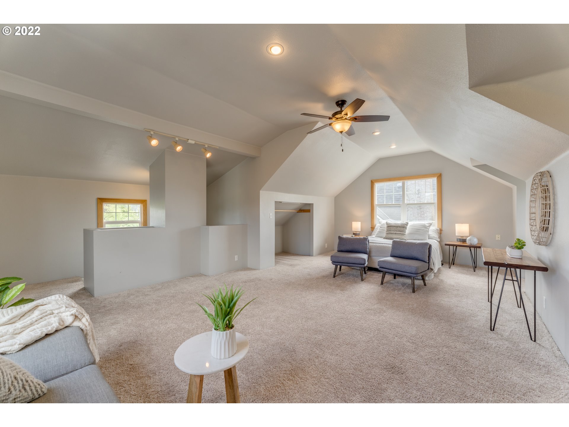 3310 Northeast 70th Avenue Portland, OR 97213 - Photo 15 of 21 a living room with furniture and a chandelier