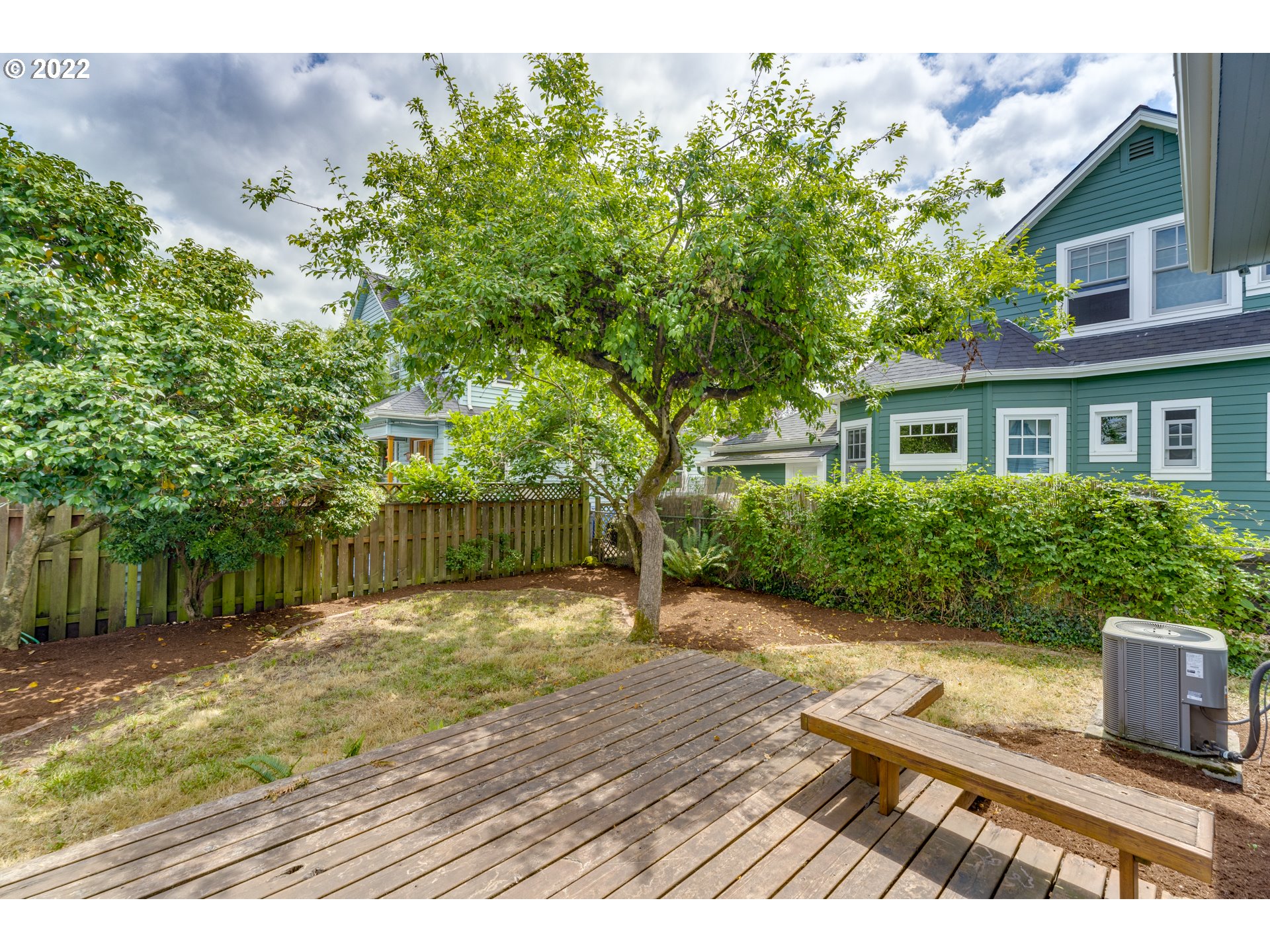 3310 Northeast 70th Avenue Portland, OR 97213 - Photo 20 of 21 a view of a backyard with sitting area