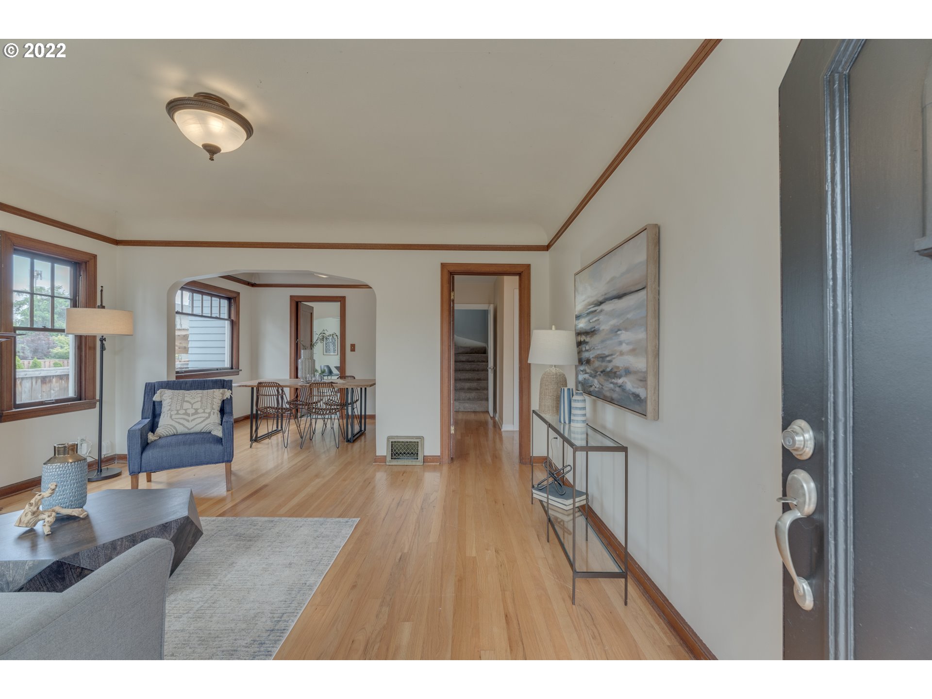 3310 Northeast 70th Avenue Portland, OR 97213 - Photo 2 of 21 a dining room with furniture and wooden floor