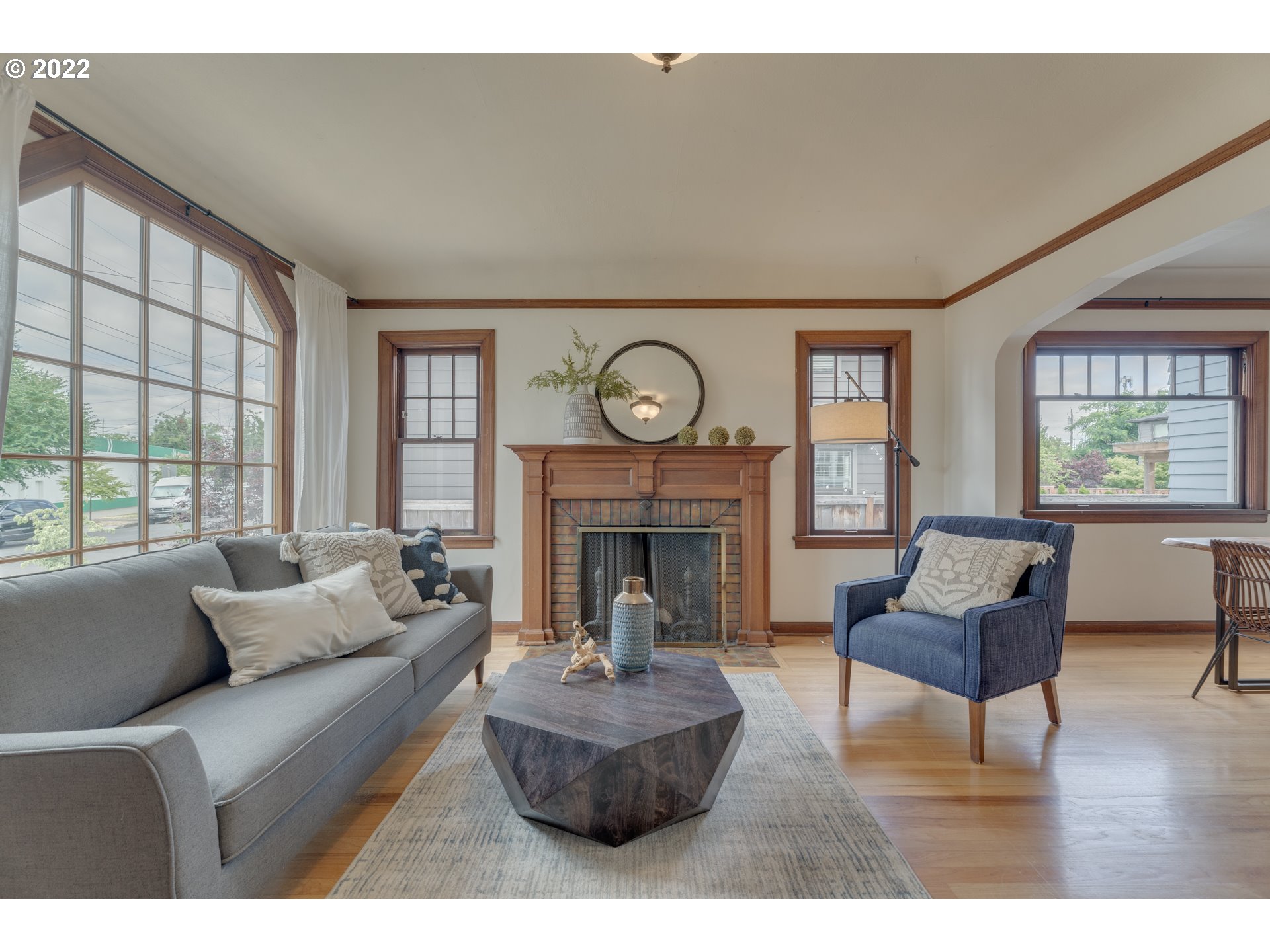 3310 Northeast 70th Avenue Portland, OR 97213 - Photo 4 of 21 a living room with furniture and a fireplace