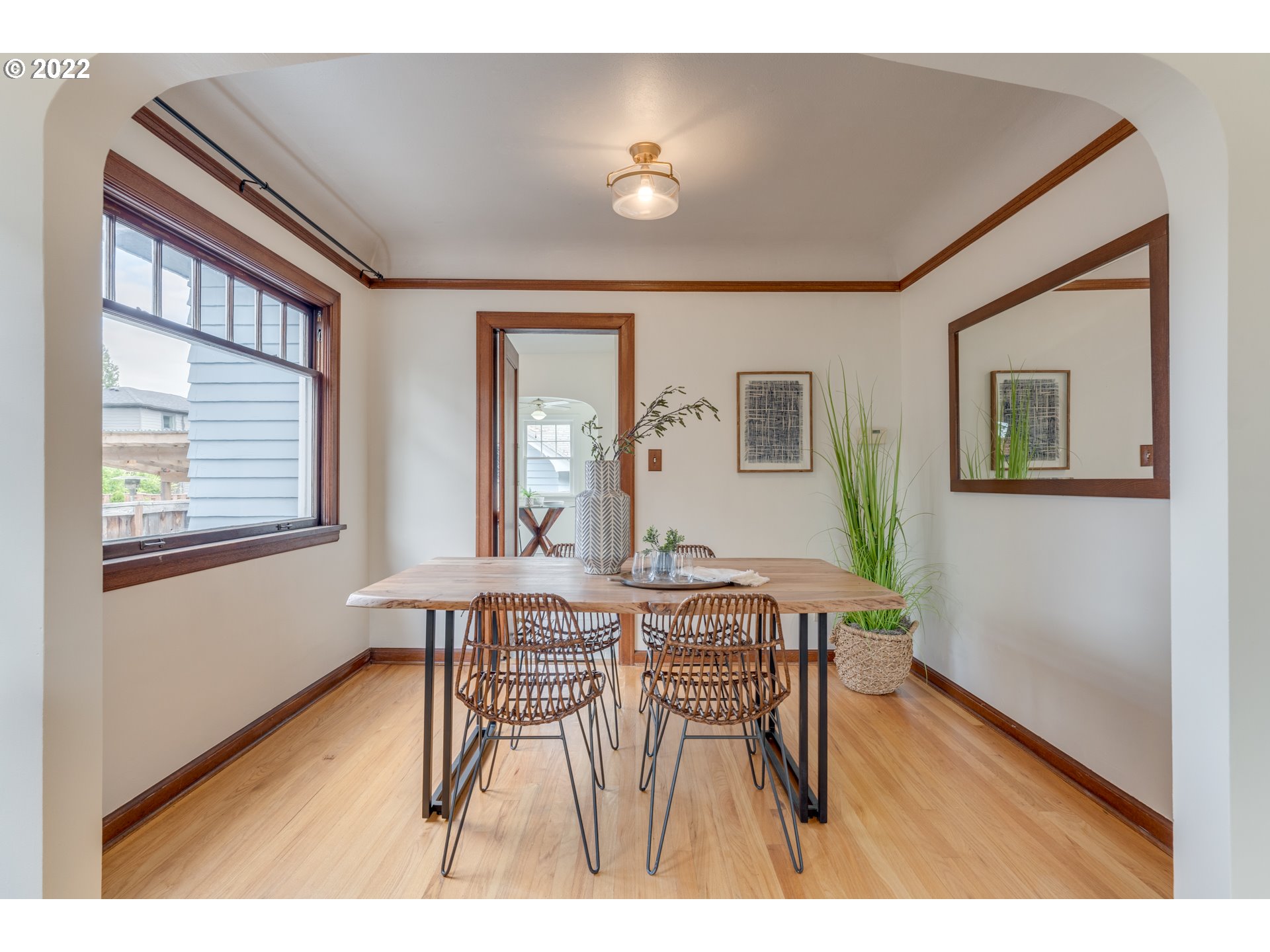 3310 Northeast 70th Avenue Portland, OR 97213 - Photo 6 of 21 a view of a dining room with furniture and a window