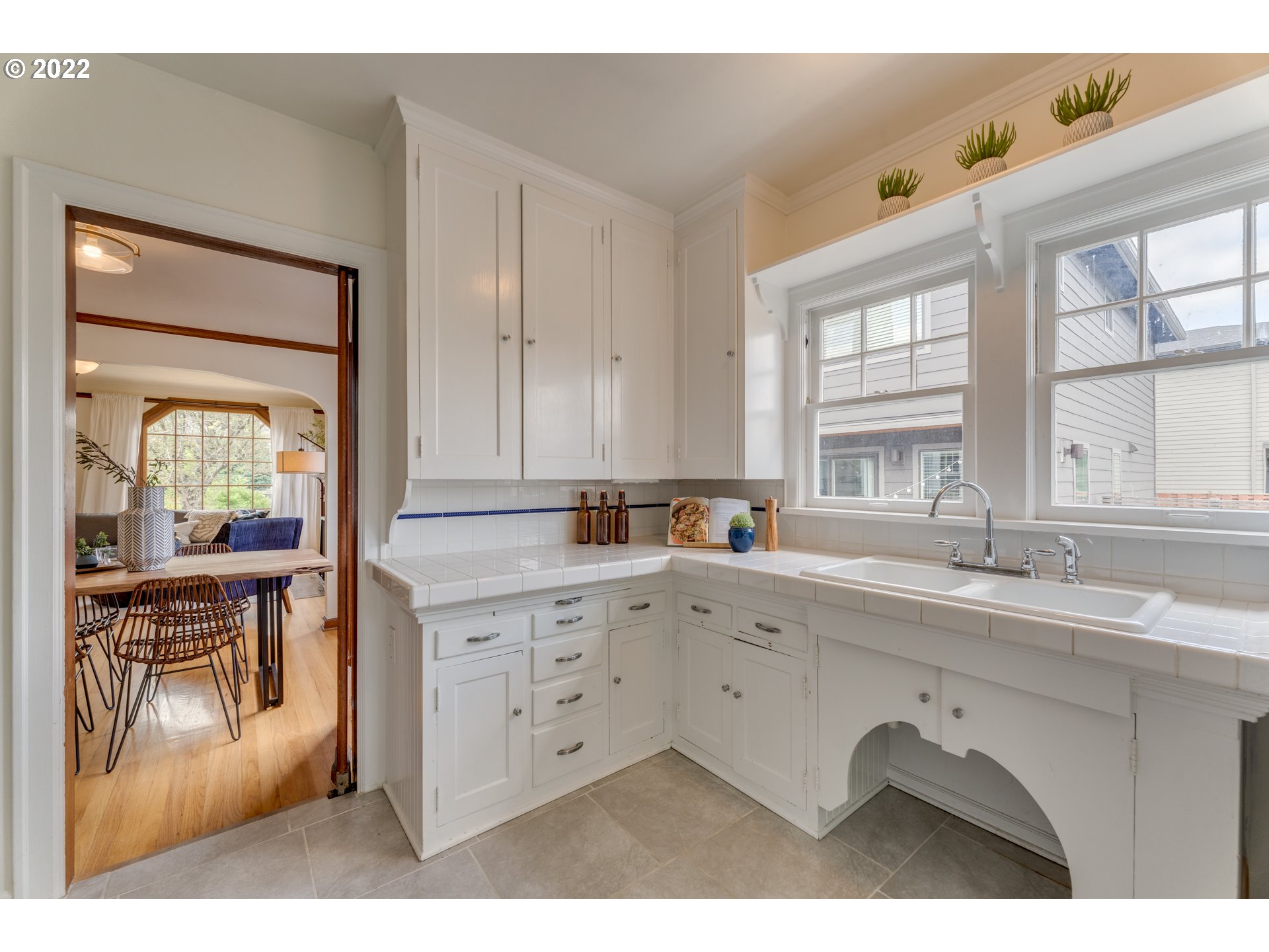 3310 Northeast 70th Avenue Portland, OR 97213 - Photo 7 of 21 a kitchen with a sink and cabinets