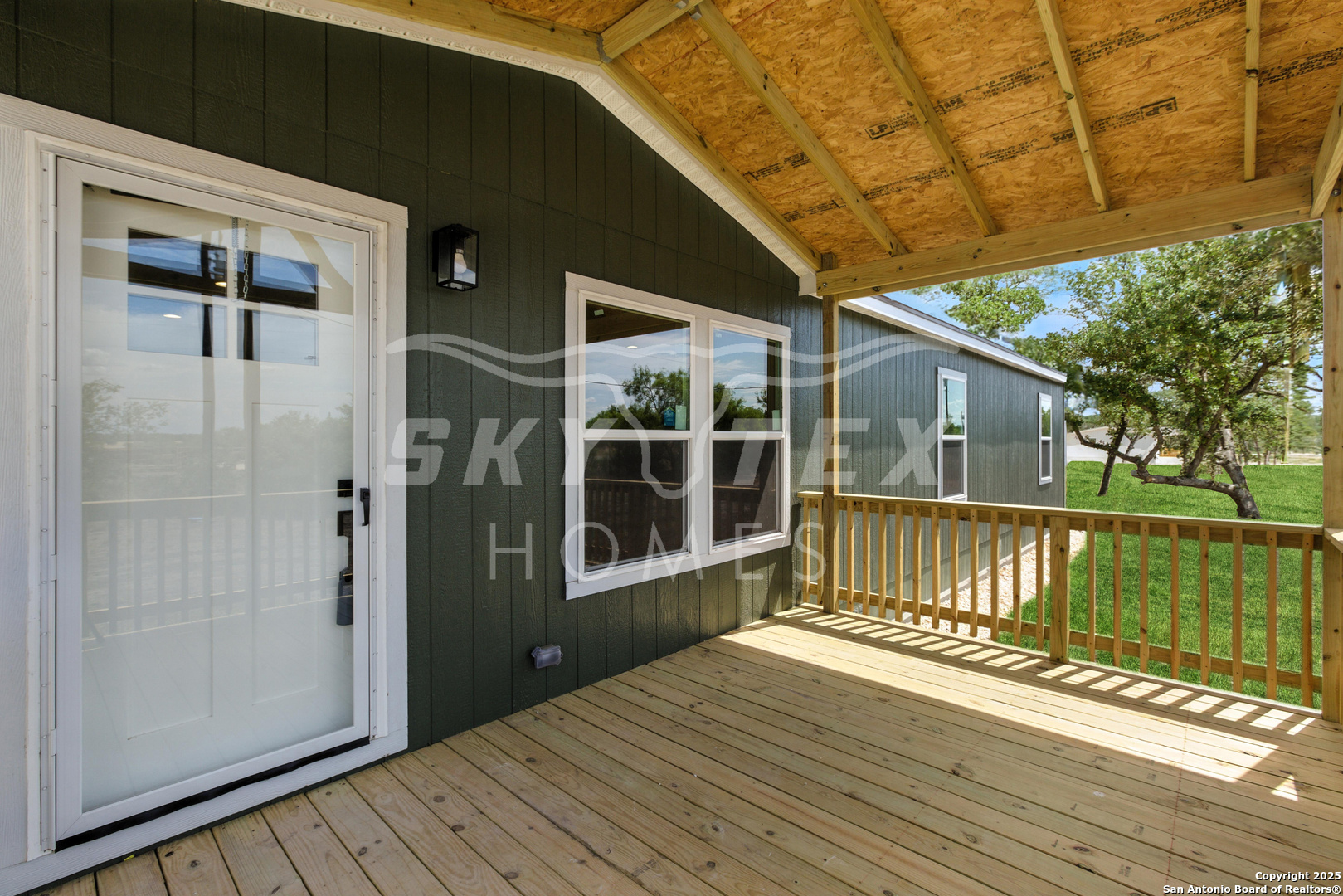 132 Syrah Street La Vernia, TX 78121 - Photo 4 of 9 a view of a house with a balcony