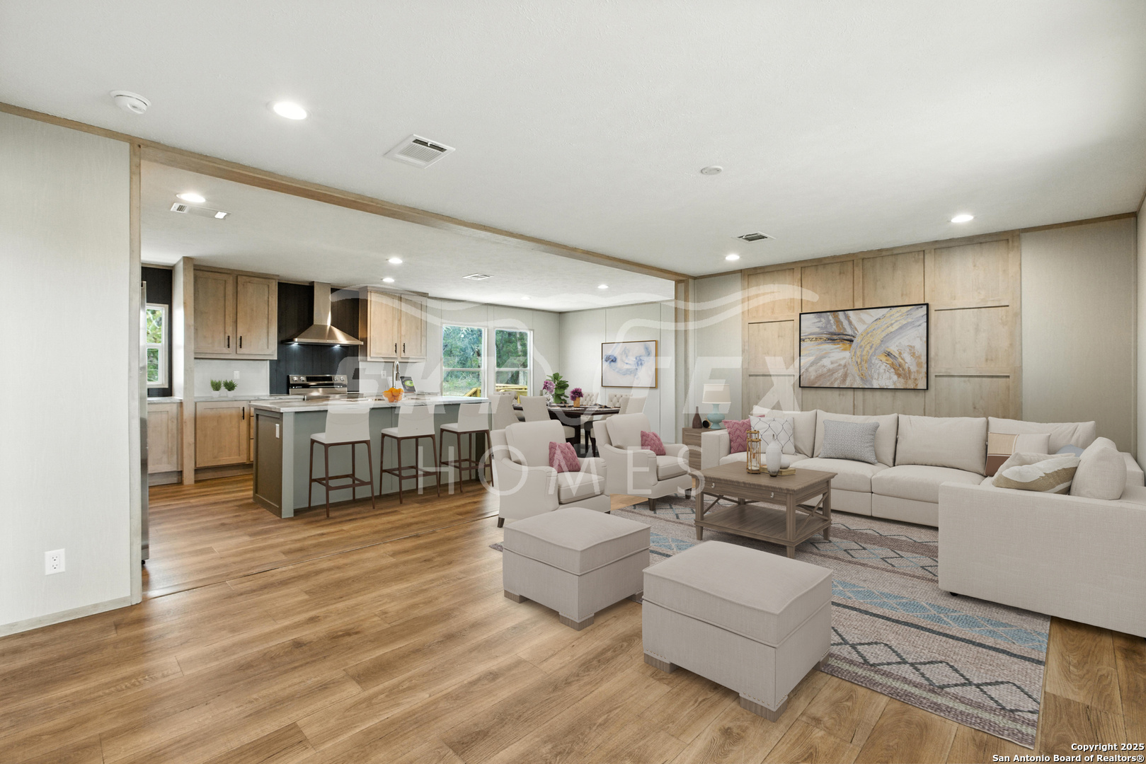 132 Syrah Street La Vernia, TX 78121 - Photo 6 of 9 a living room with furniture white walls and kitchen view