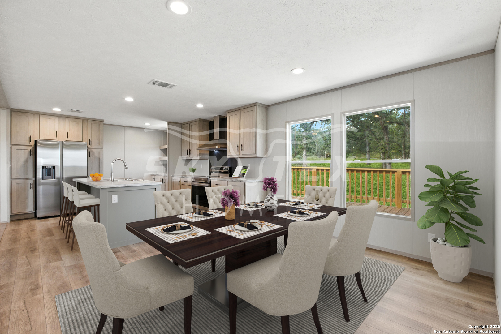 132 Syrah Street La Vernia, TX 78121 - Photo 7 of 9 a view of a dining room with furniture window and wooden floor