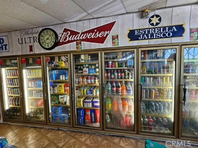 a view of a store with a lot of signs