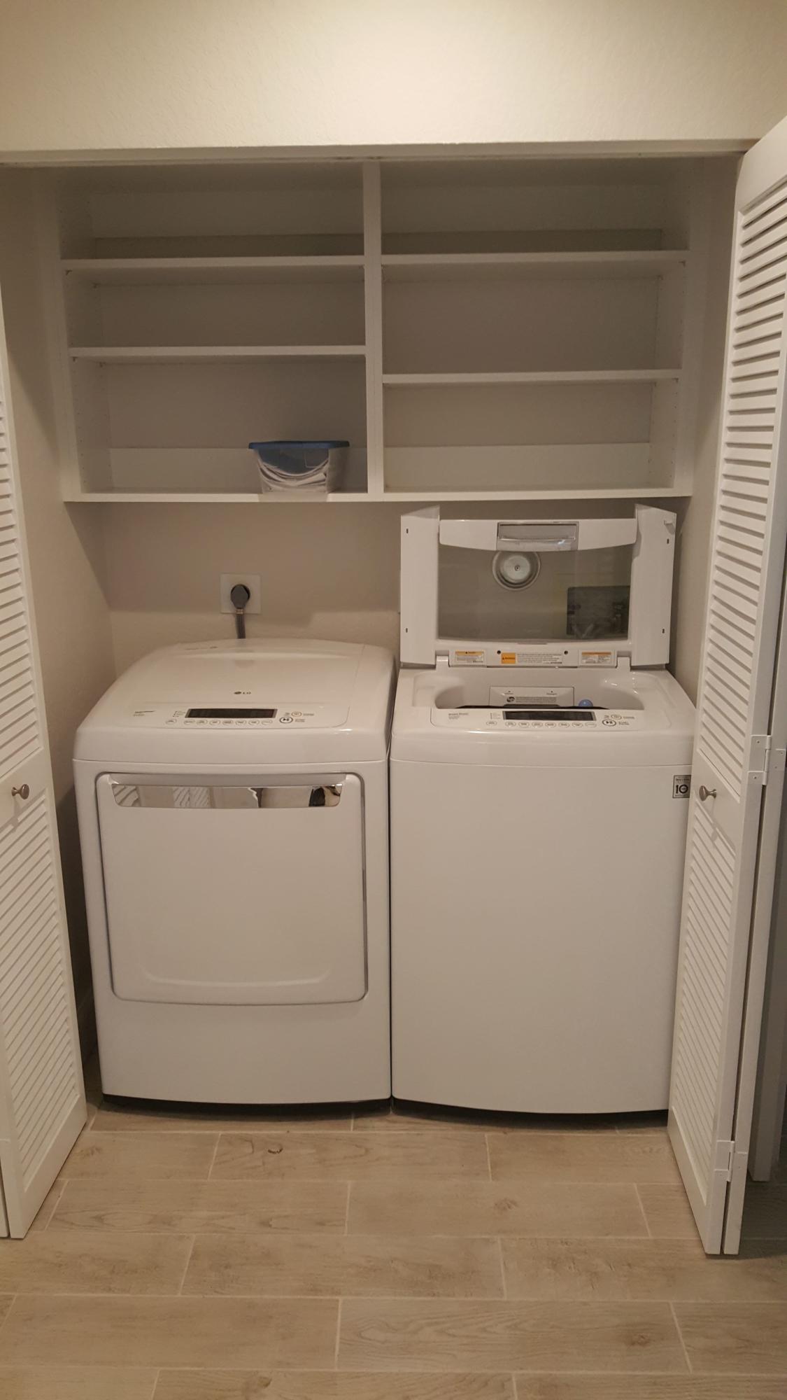 17046 Boca Club Boulevard, Unit 6 Boca Raton, FL 33487 - Photo 13 of 16 a utility room with washer and dryer